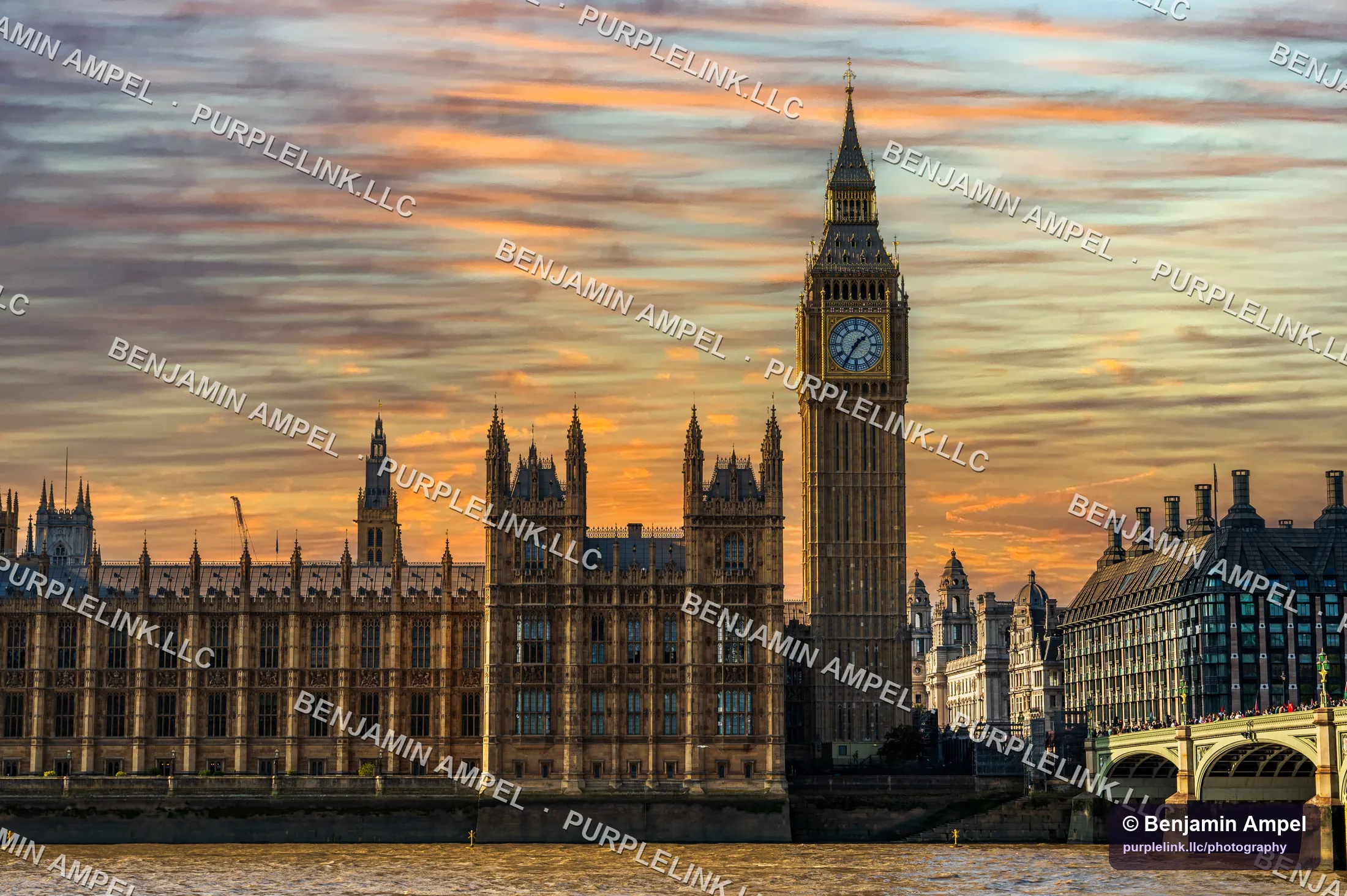 Big Ben and the Houses of Parliament under an orange and violet sunset sky