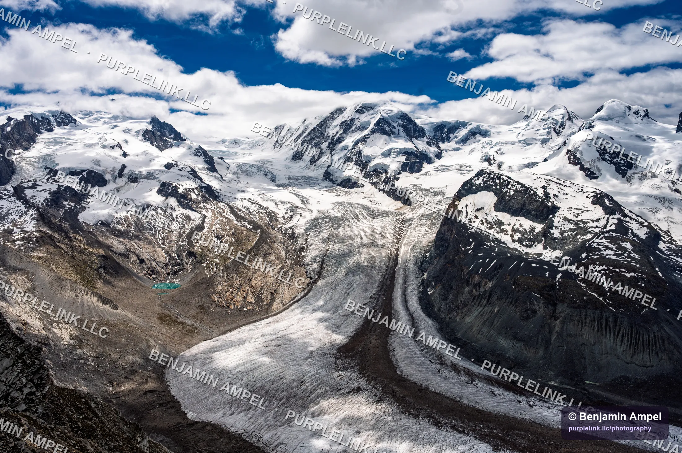 The Gorner Glacier winding between snow-covered peaks above Zermatt