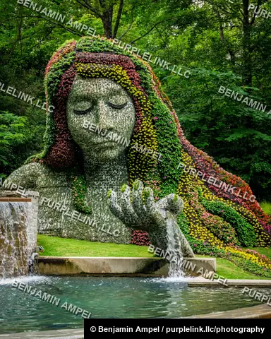 Atlanta, Georgia - May 2026: The Earth Goddess living topiary sculpture, crafted from thousands of flowering plants, rests at the Atlanta Botanical Garden.