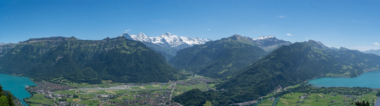 Panoramic view of Interlaken between Lake Thun and Lake Brienz, with mountains on both sides